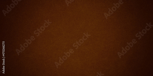 Dark red abstract grunge background color, light canter spotlight, faint orange vintage background 