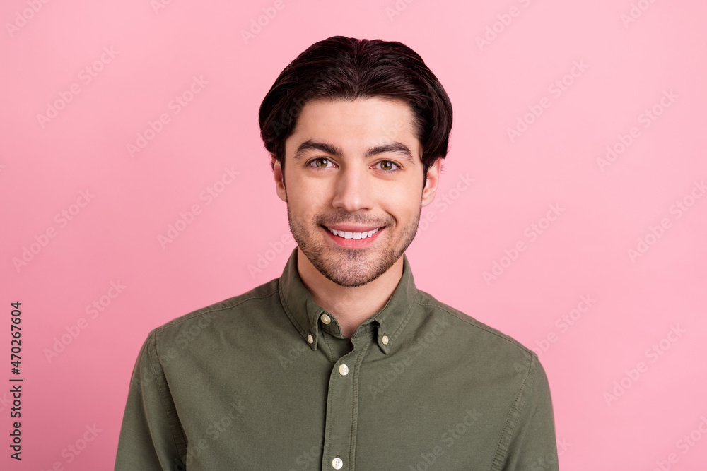 Photo of cheerful positive man sincere toothy beaming smile wear khaki shirt isolated pink color background Photo of cheerful positive man sincere toothy beaming smile wear khaki shirt isolated pink color background