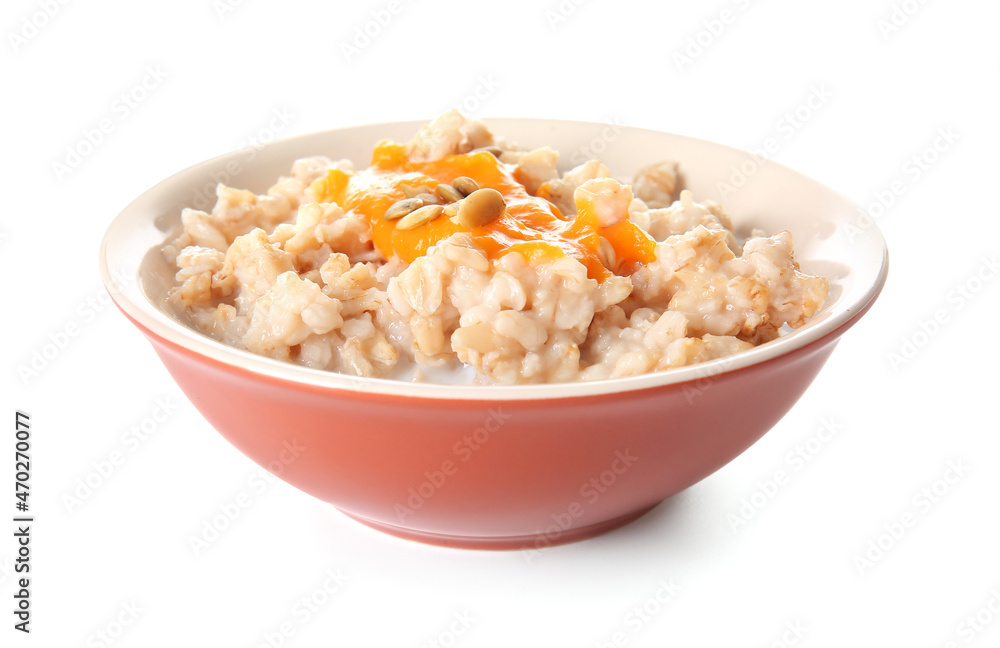 Bowl of tasty oatmeal with pumpkin on white background Bowl of tasty oatmeal with pumpkin on white background