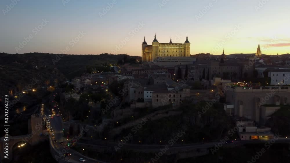 Drone flight over the night city lights of Toledo, Spain Drone flight over the night city lights of Toledo, Spain