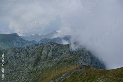 Beautiful mountain view above clouds from peak Djeravica  Gjerovica  - the highest peak of Kosovo. Albanian Alps  Peaks of Balkans