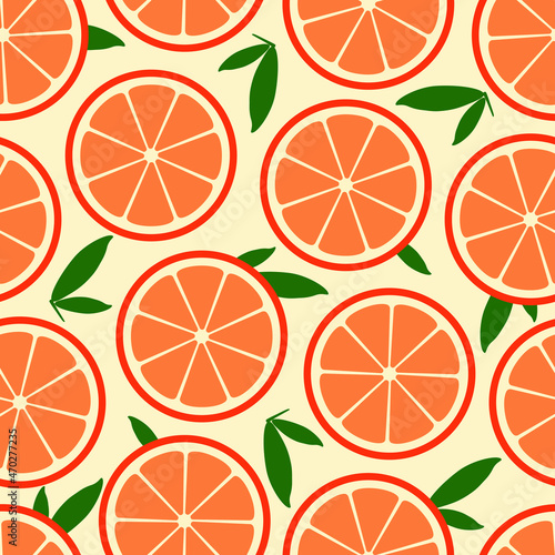 Seamless vector pattern with orange slices and green leaves