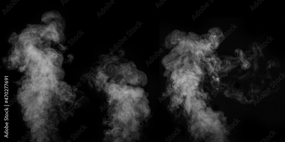 A set of different vapors, smoke on a black background to overlay on your photos. White vapor spray steams from air saturator. Smoke fragments on a black background.