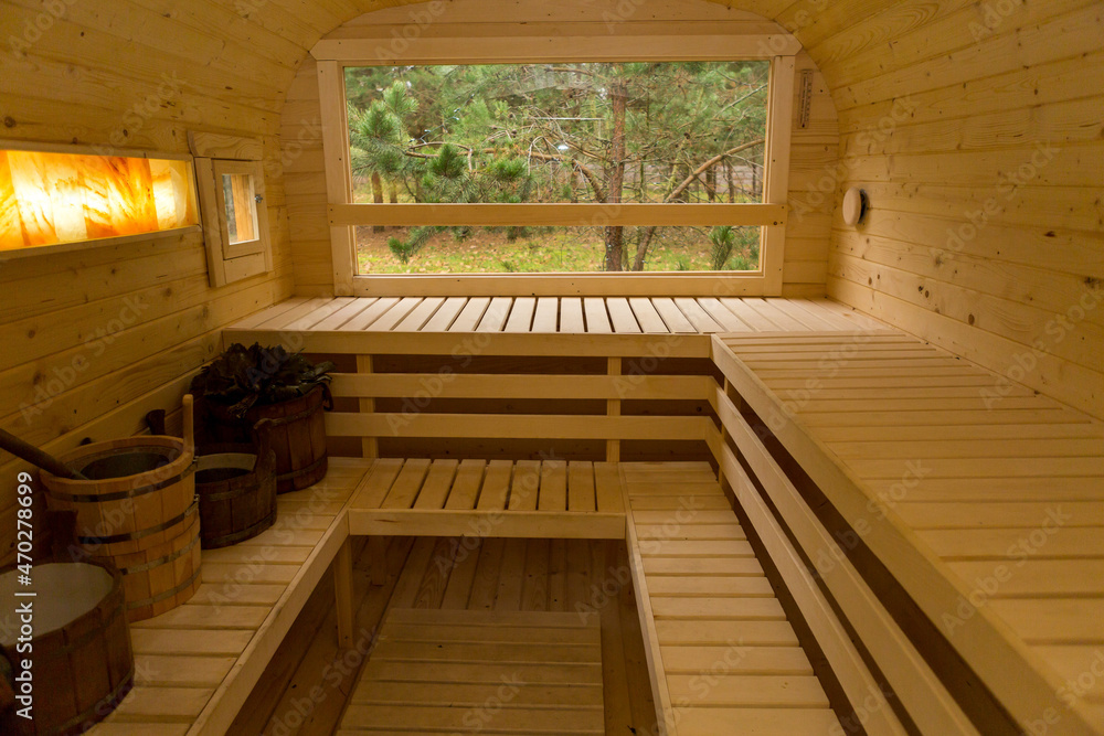 Fototapeta premium Finnish sauna interior made of wood for relaxation