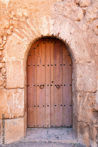 View of an old wooden castle door for background texture © Alfredo