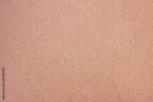 A sheet of brown cardboard. Paper natural texture.
