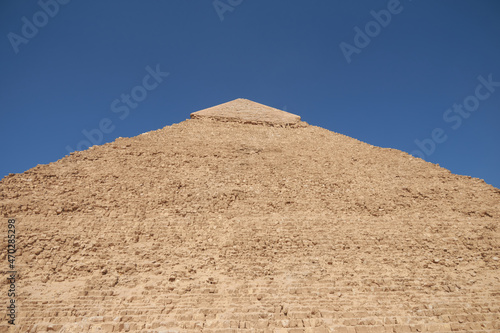 Side and faced top of  Pyramid of Khafre  also read as Khafra  Khefren  or of Chephren is the second-tallest and second-largest of the Ancient Egyptian Pyramids of Giza