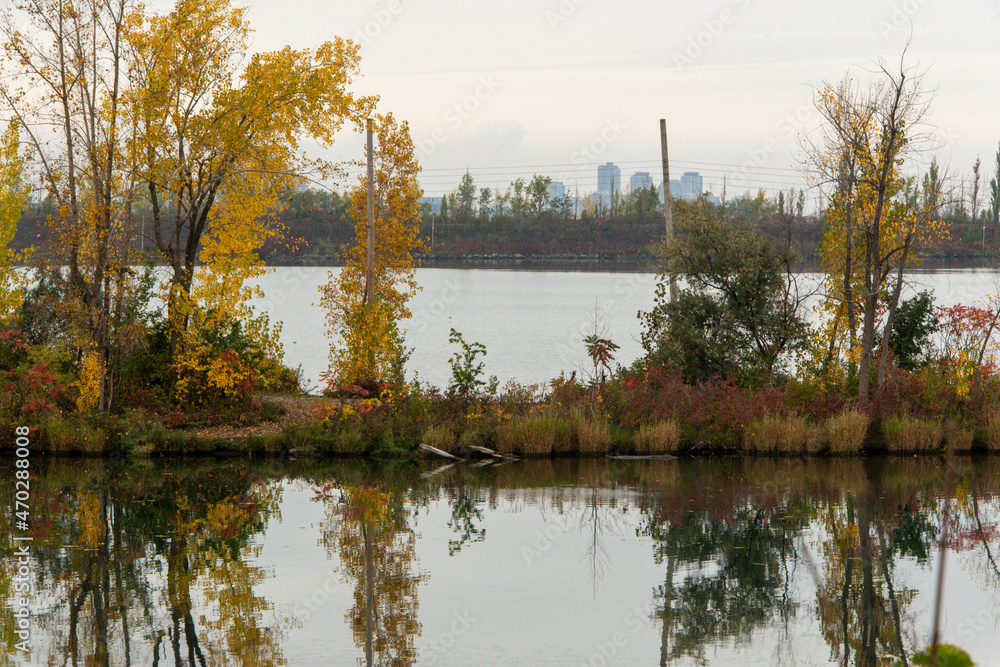 View of the waterway in autumn near Montreal. View of the waterway in autumn near Montreal.