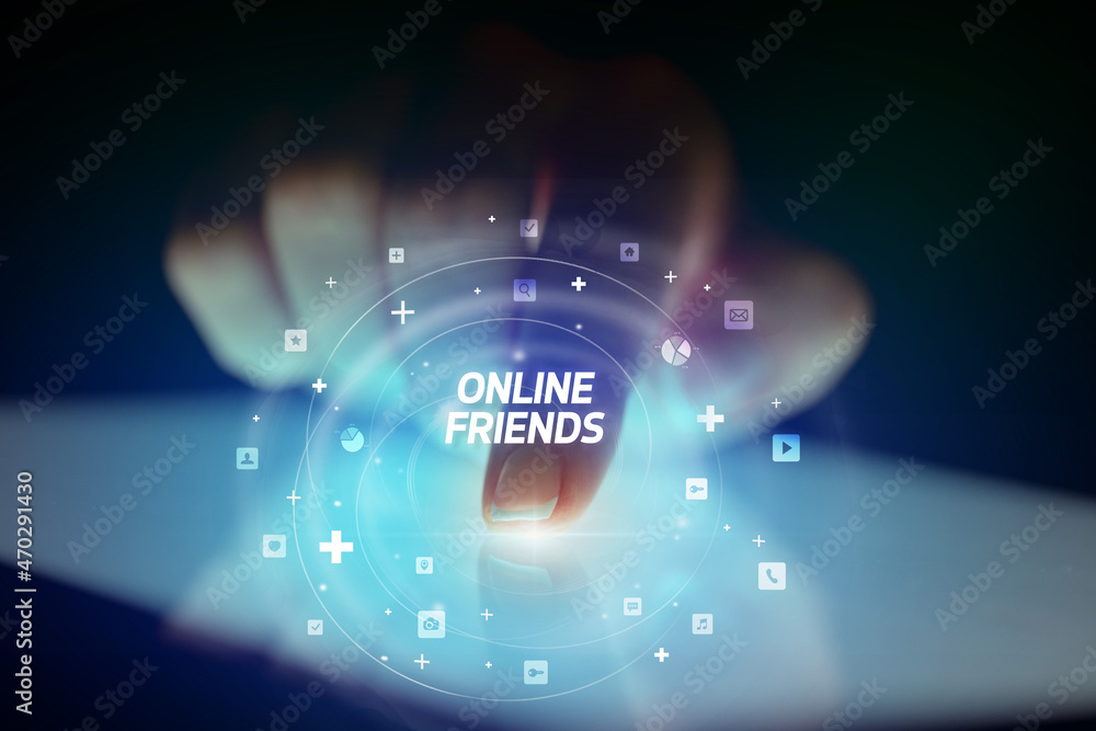 Finger touching tablet with social media icons concept Finger touching tablet with social media icons concept