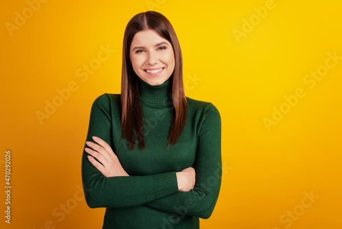 Photography Photo of confident positive lady folded arms shiny smile wear green shirt isolat