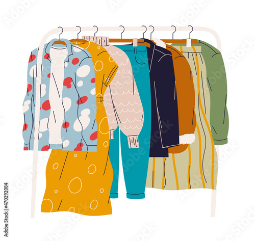 Clothes hanging on a hanger in the checkroom or store.