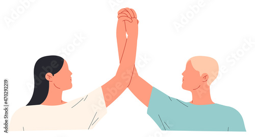 Hands of man and woman holding each other showing unity and togetherness