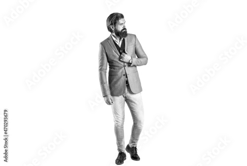 Elegant handsome man in suit. Handsome bearded businessman in classic suits. Man in suit. Male beard and mustache. Sexy male, brutal macho, hipster. Hand in with wrist watch in a business suit