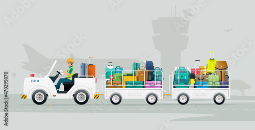 A worker drives a truck carrying luggage onto a plane at the airport.