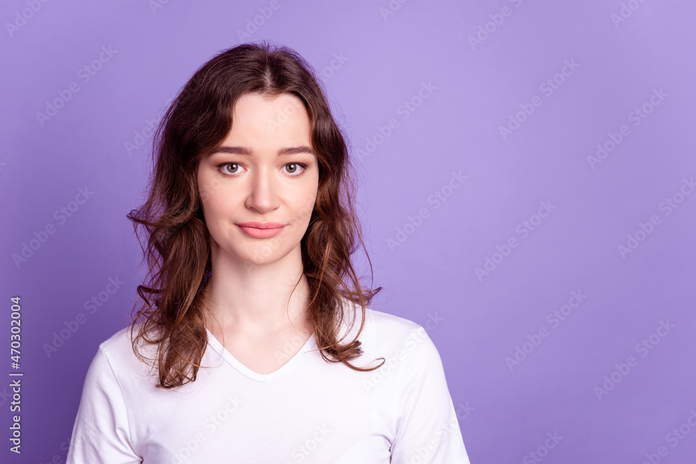 Photo of young attractive woman confident intelligent wear casual white t-shirt isolated over violet color background Photo of young attractive woman confident intelligent wear casual white t-shirt isolated over violet color background