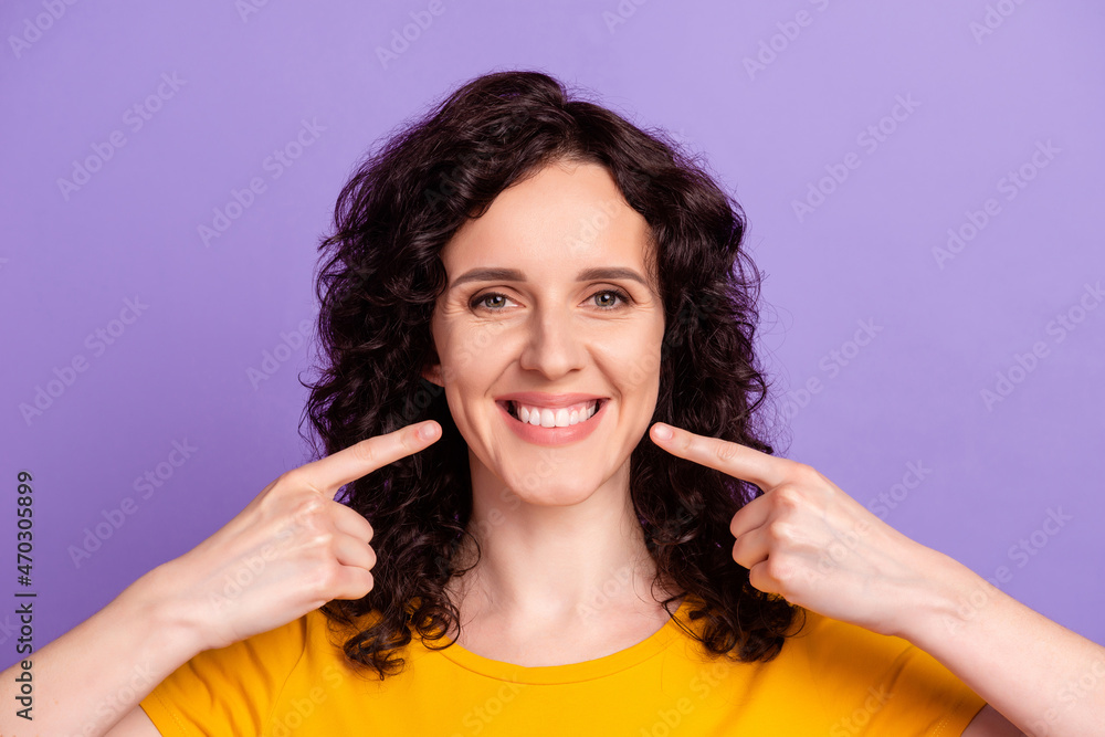 Photo of young attractive girl inidcate figners teeth cavity protection dentistry isolated over violet color background