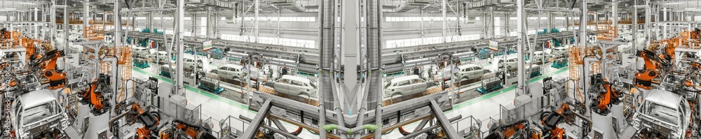 Mirror Panoramic Photo. Automobile production line. Welding car body. Modern car assembly plant Mirror Panoramic Photo. Automobile production line. Welding car body. Modern car assembly plant