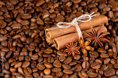 star anise with cinnamon on coffee beans
