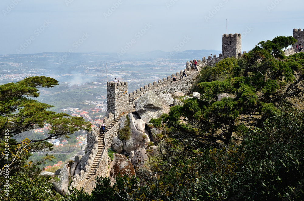 Naklejka premium Fortress Wall of the Castle of the Moors and the Panoramic View of Sintra Suburbs near Lisbon