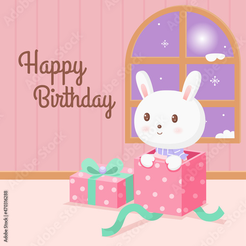 little rabbit in a pink polka dot gift box