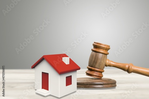 Gavel wooden and house for home buying or selling of bidding or lawyer, real estate and building concept.