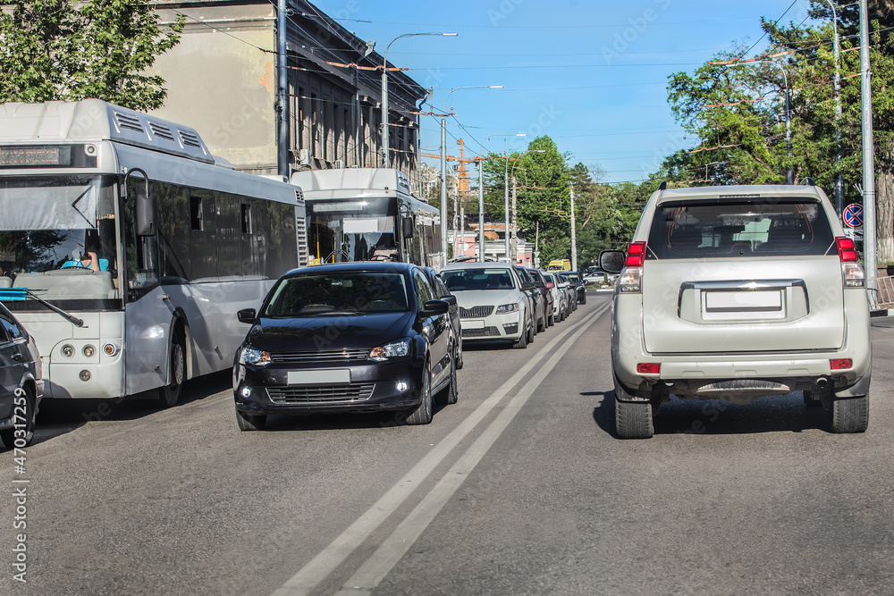 Car traffic on a city street Car traffic on a city street