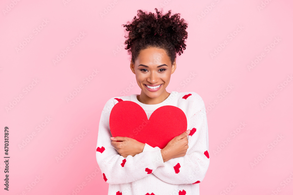 Photo of lovely curly hairdo young lady hug heart wear white pullover isolated on pink background Photo of lovely curly hairdo young lady hug heart wear white pullover isolated on pink background