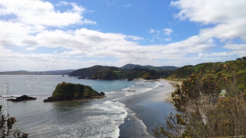 Pacific coast view of Punihuil beach on Chiloe Island, Chile.