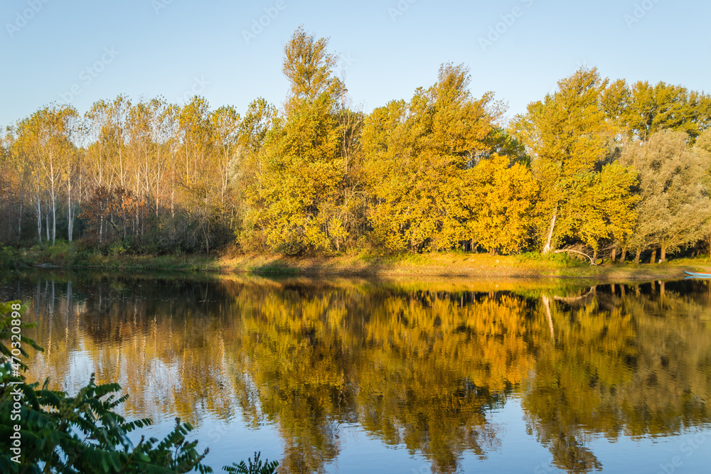 Begec, Serbia - October 30. 2021: Autumn panorama on the artificial lake Begecka jama, near the city of Novi Sad. 