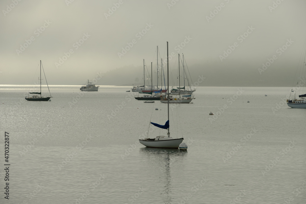Foggy morning over Rockland Harbor in Maine on one of the last days of Summer
