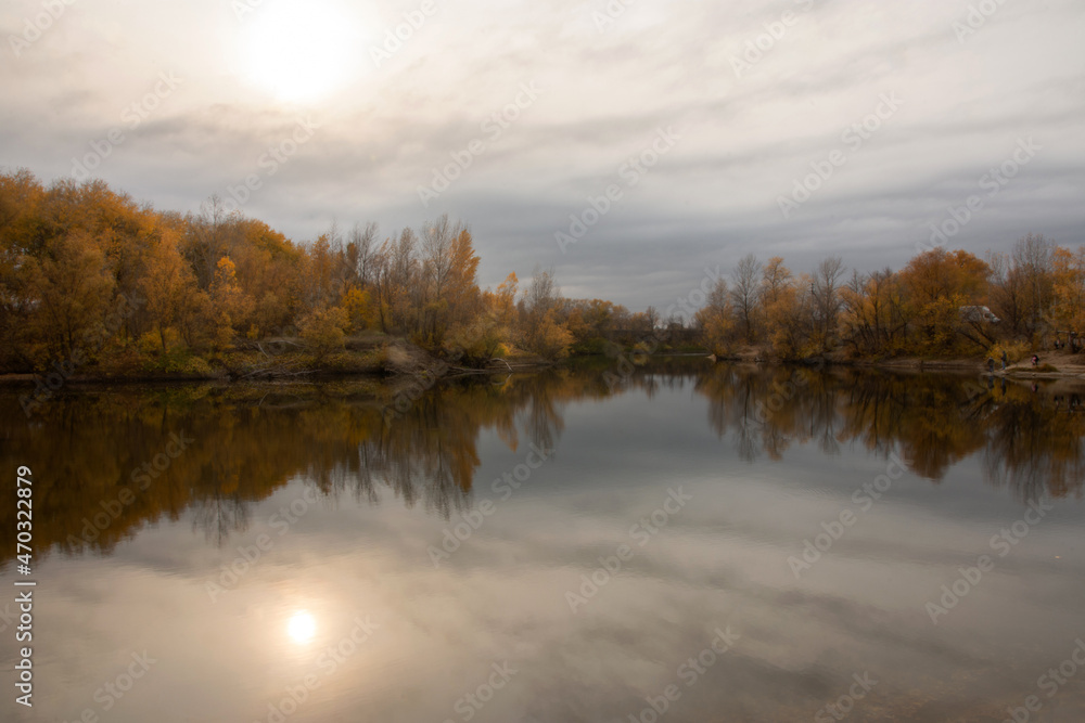 Autumn at pond in evening