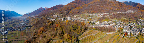 autumnal aerial panorama of Tresivio in Valtellina, Italy photo