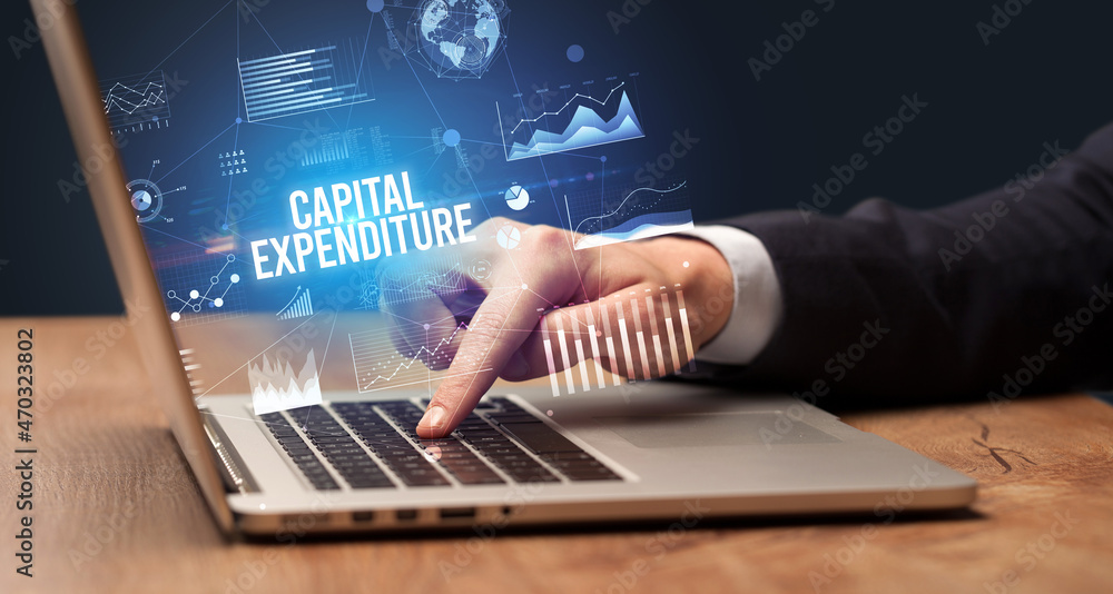 Businessman working on laptop, business concept Businessman working on laptop, business concept