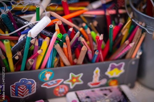 pencils, colored pencils, creative clutter on the table, drawing tools, children's creativity