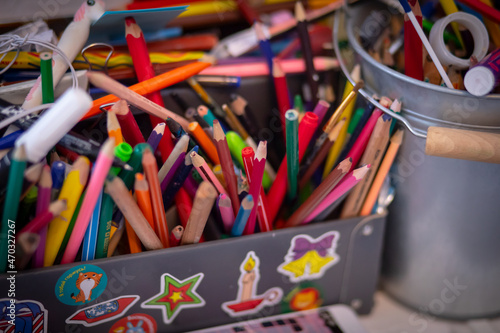 pencils, colored pencils, creative clutter on the table, drawing tools, children's creativity