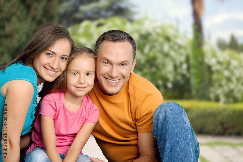 Time with family. Overjoyed family laughing and posing to camera Time with family. Overjoyed family laughing and posing to camera