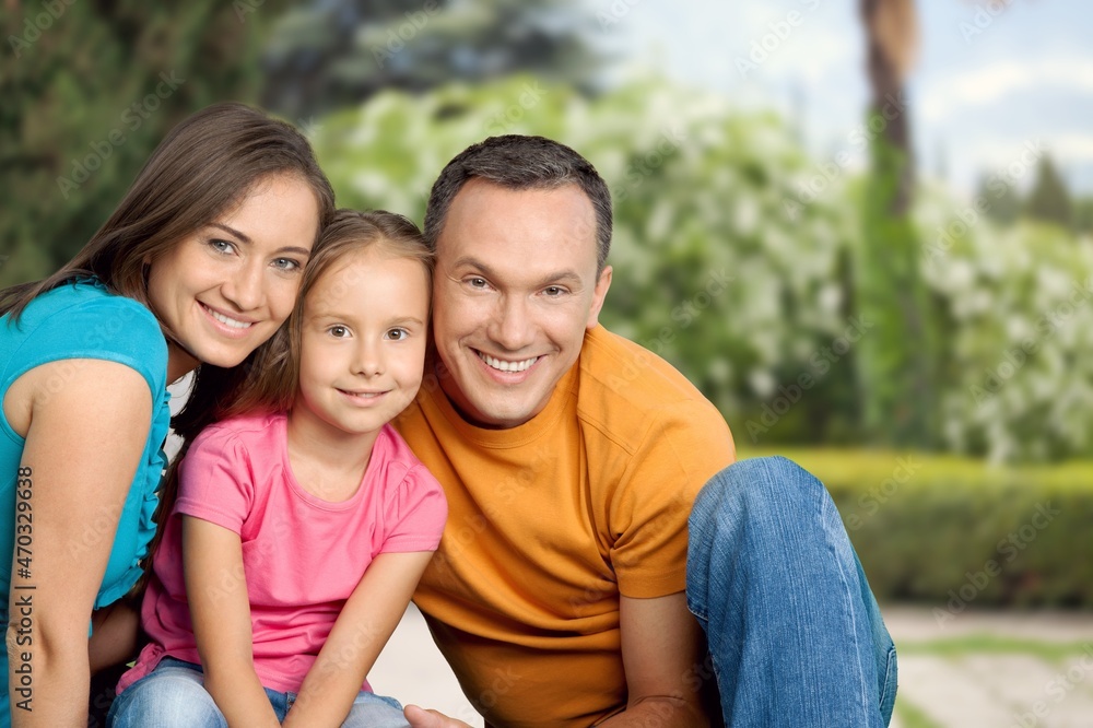 Time with family. Overjoyed family laughing and posing to camera