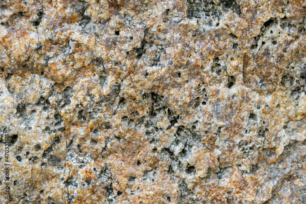 Granite background. Rough granite surface stone crystal natural surface. Natural stone granite texture Granite background. Rough granite surface stone crystal natural surface. Natural stone granite texture