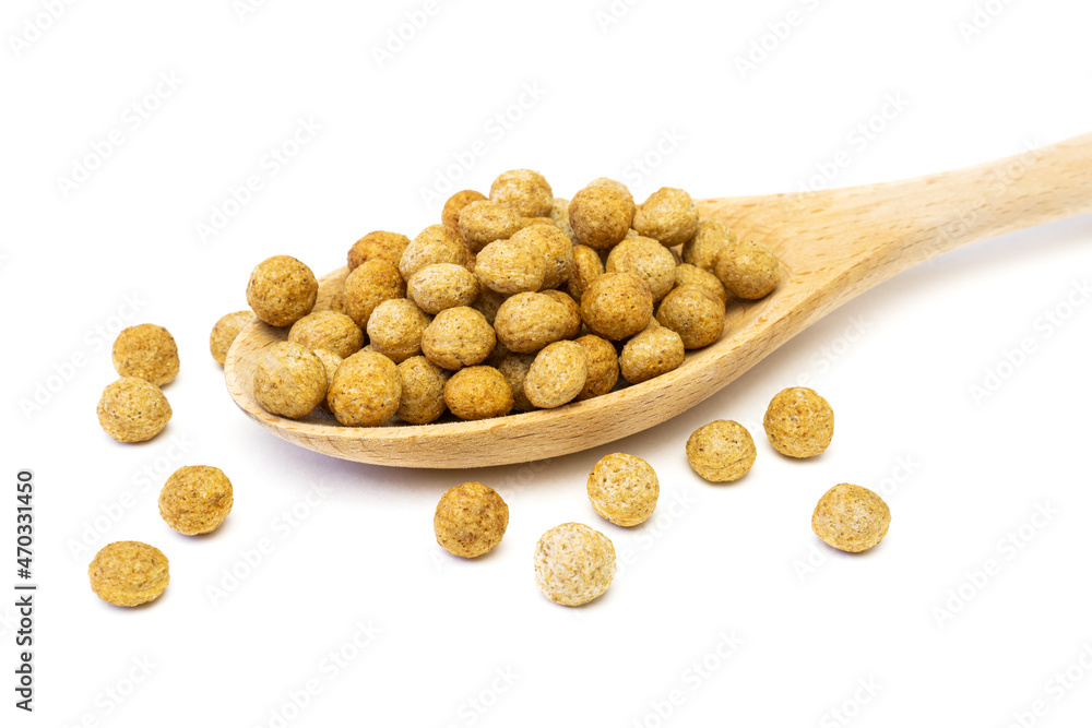 Cereal rye and oats breakfast balls in spoon isolated on white background. Cereal rye and oats breakfast balls in spoon isolated on white background.