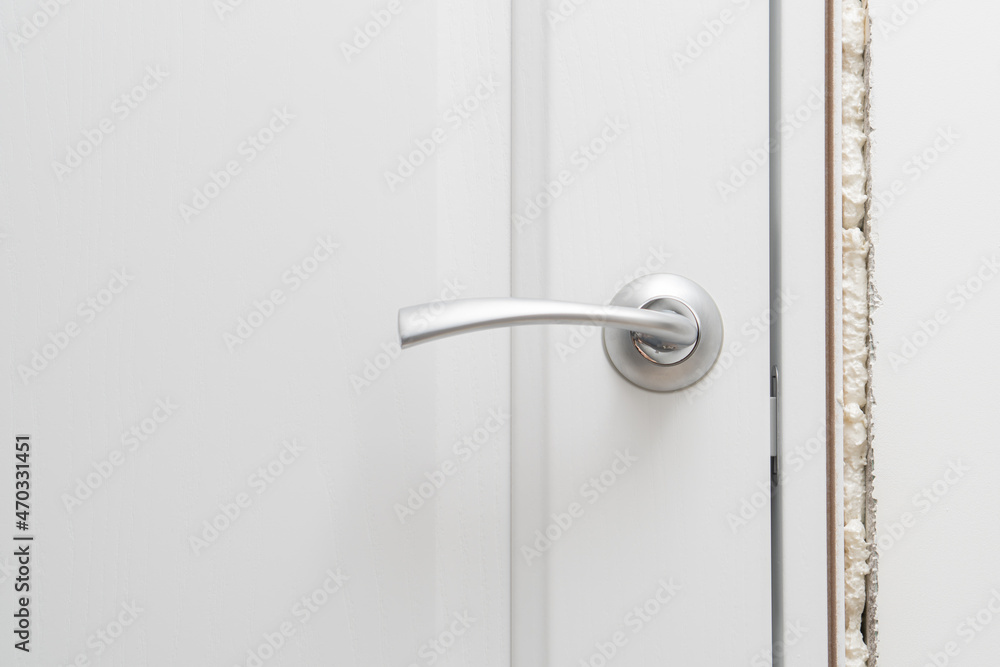 Installation of an interior door with fixation on polyurethane foam. Installation of an interior door with fixation on polyurethane foam.