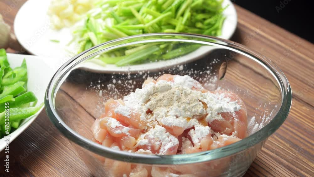 Stir-fried shredded chicken with garlic sprouts, a common home cooking in China Stir-fried shredded chicken with garlic sprouts, a common home cooking in China