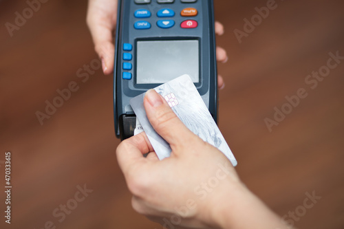 Wallpaper Mural digital payment,hand pays by credit card via contactless terminal Torontodigital.ca