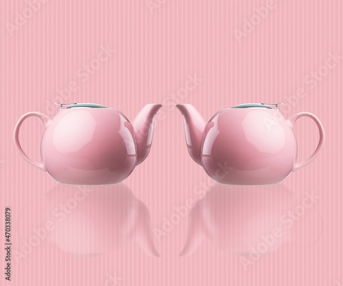Two porcelain teapots on a pink background. Concept of female health and Breast Cancer Awareness Month.