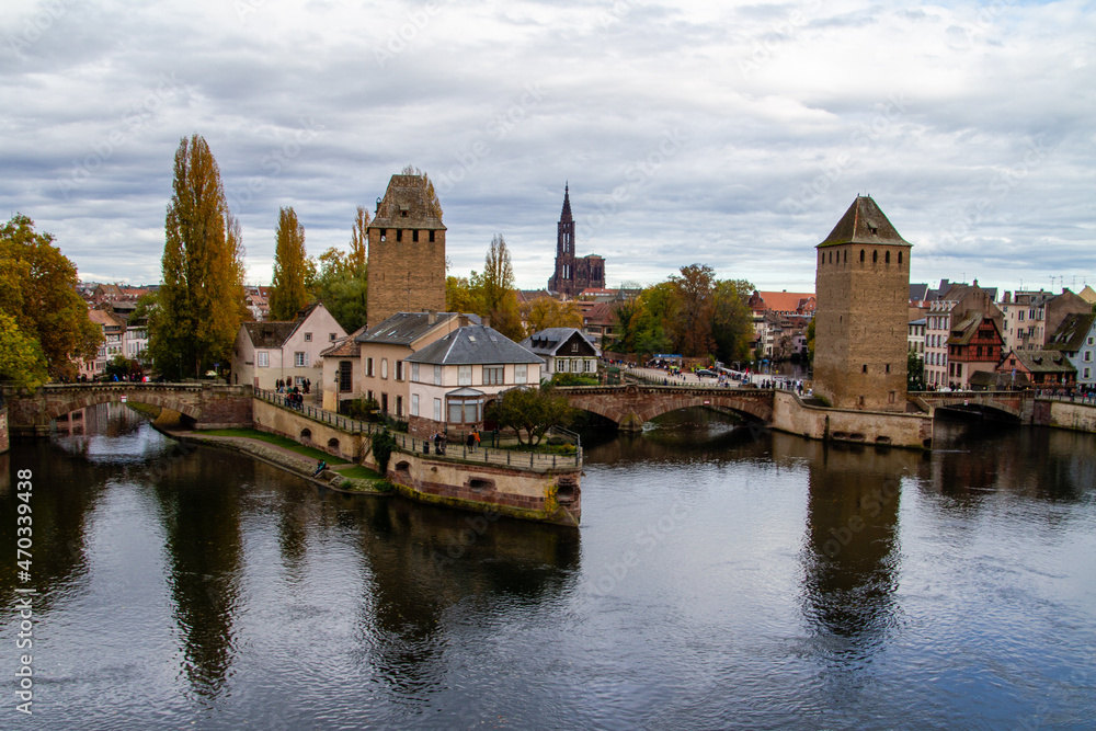 Strasbourg, France, October 31, 2021, The covered bridges of Strasbourg are three bridges spanning the Ill in the heart of Petite France. Strasbourg, France, October 31, 2021, The covered bridges of Strasbourg are three bridges spanning the Ill in the heart of Petite France.