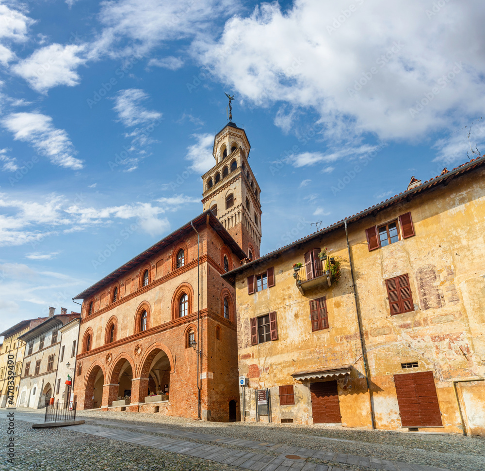 Saluzzo, Cuneo, Italy,  the ancient town hall (15th century) in Salita al Castello with the civic tower and ancient buildings in the old town of Saluzzo