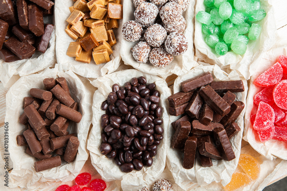 Assortment of delicious chocolate candies background. Chocolate candy isolated Assortment of delicious chocolate candies background. Chocolate candy isolated