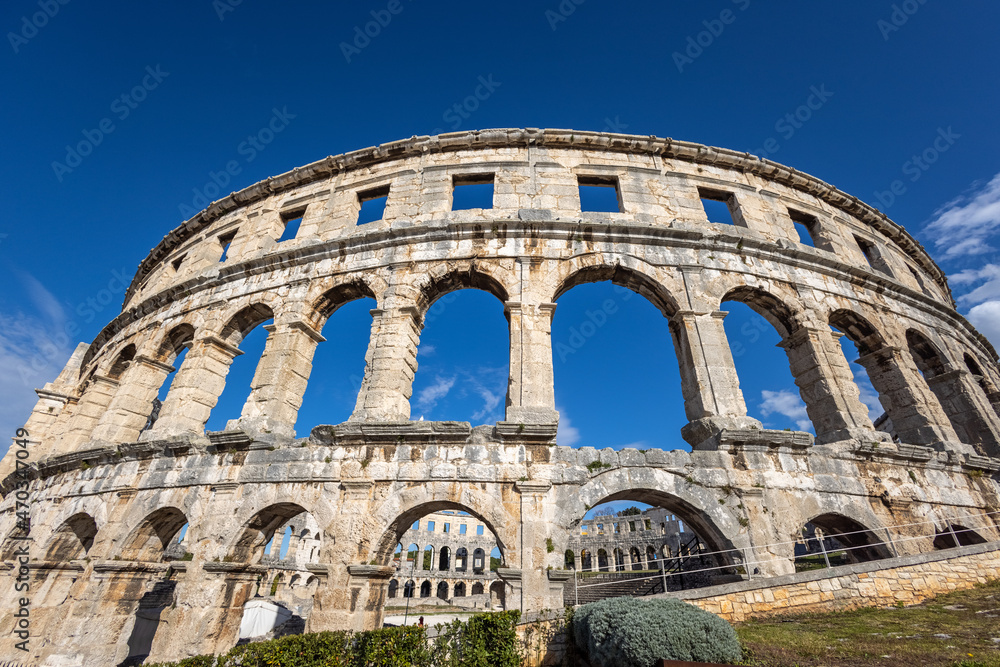 A wall fragment of ancient Roman amphitheater - Arena in Pula, Croatia