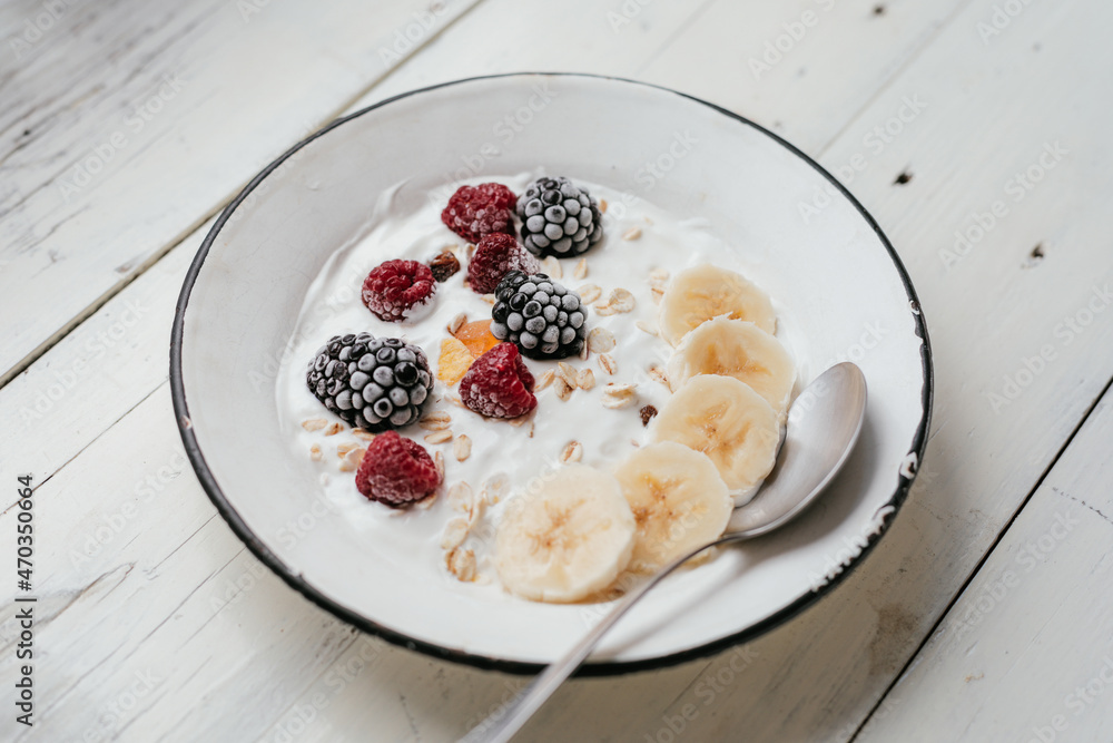 Muesli breakfast banana raspberry blackberry Muesli breakfast banana raspberry blackberry