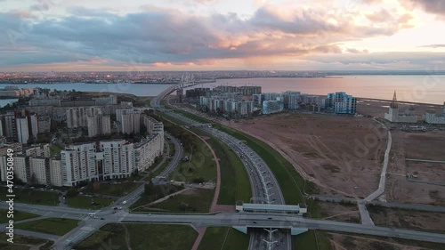 Fly over high speed road in Saint Petersburg, Russia. Highway with a lots of cars. Western high-speed diameter. Sunset time.