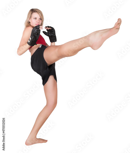 young blond karate woman doing kickboxing